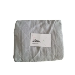 сірий плед з геометричним візерунком деталі візерунка