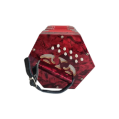 red diatonic accordion top view with strap