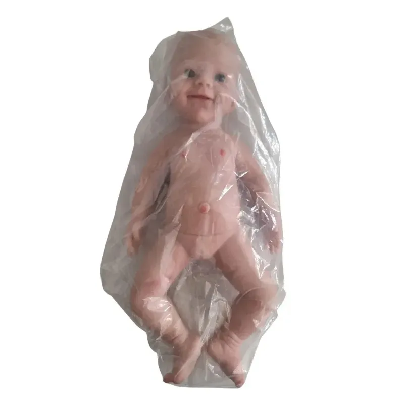 Reborn Babypuppe Mädchen lächelnd mit Kleidung und Mütze Reborn Babypuppe Mädchen lächelnd mit Kleidung und Mütze