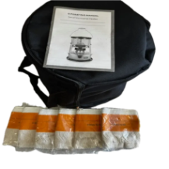 small oil heater in carrying case with instructions and spare wicks