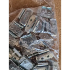 metallene Fahrradreifen-Gewichte in einer Tüte mit Details