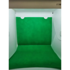 foldable photography studio interior view with green background