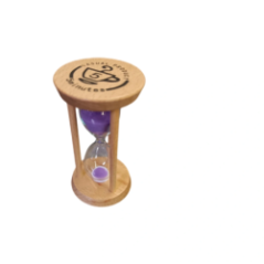 Hourglass standing on a countertop seen from above and the side.