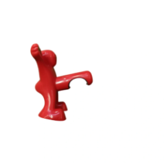 Red cap opener in the shape of a human figure with a metal element