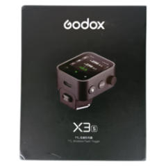 Packaging of Godox X3S flash trigger with a ruler
