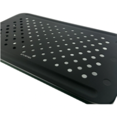 Close-up of the perforated surface of the stand with ATUMTEK logo