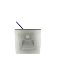 Recessed LED light showing motion sensor and wires